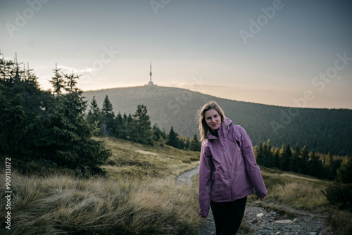 Young woman on a hike in the mountains of central Europe