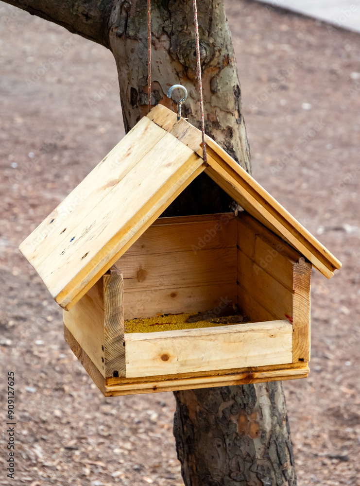 Bird feeder made from tongue and groove floorboards Bird feeder made from tongue and groove floorboards