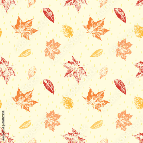 Cute seamless autumn pattern with autumn leaves stamps and rain drops. Vector illustration.