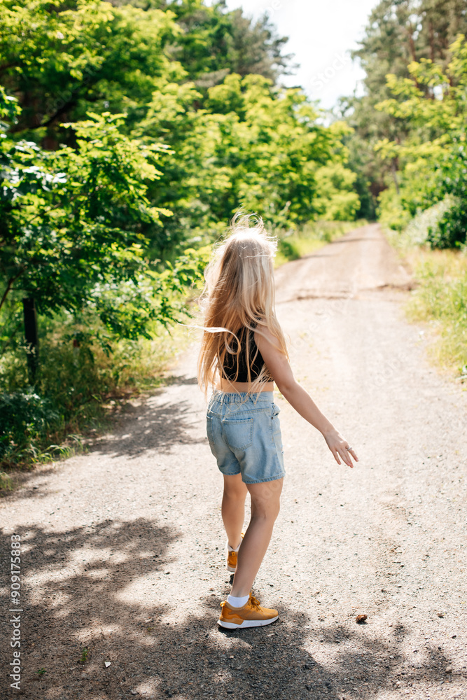 Playful Girl Reaching Out in a Sunlit Forest Playful Girl Reaching Out in a Sunlit Forest