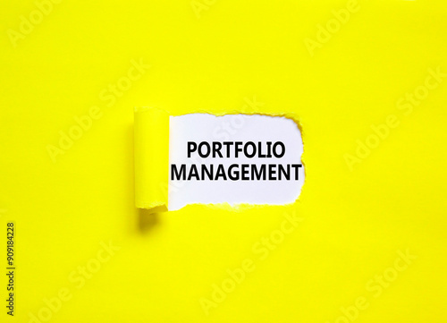 Portfolio management symbol. Concept words Portfolio management on beautiful white paper. Beautiful yellow paper background. Business Portfolio management concept. Copy space.