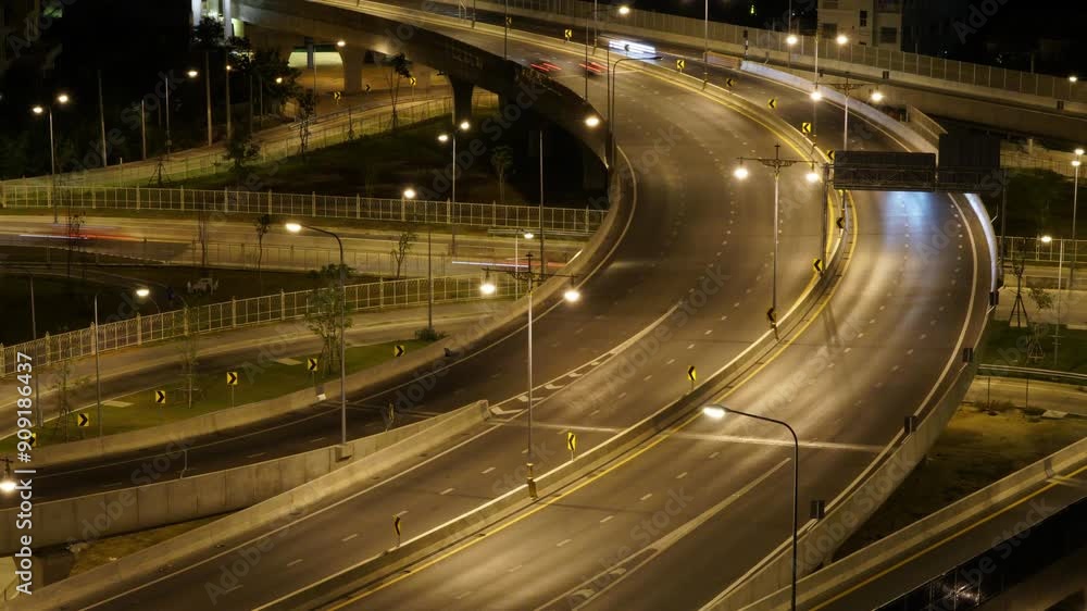 A highway with a bridge over a river. The bridge is curved and the cars are driving on the highway A highway with a bridge over a river. The bridge is curved and the cars are driving on the highway