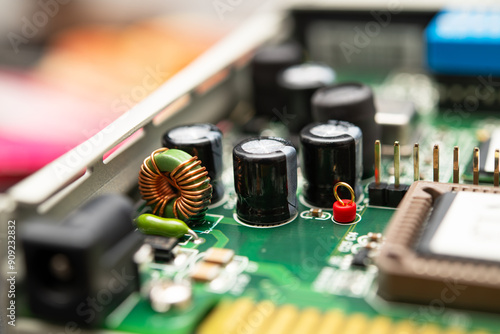 Close-Up of Modern Electronic Circuit Board with Capacitors and Inductor for Technology Enthusiasts
