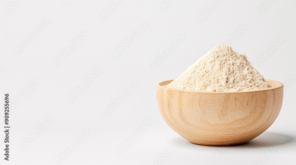 Wooden Bowl of Flour: A rustic wooden bowl brimming with a mound of unbleached, organic flour on a clean white background. Perfect for baking, cooking, and healthy eating imagery. Wooden Bowl of Flour: A rustic wooden bowl brimming with a mound of unbleached, organic flour on a clean white background. Perfect for baking, cooking, and healthy eating imagery.