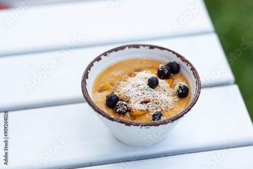 Dessert Blancmange with Crimean peach and fresh berries photo