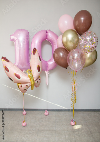 pink butterfly balloon on white background