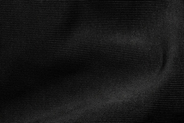 closeup of black ice silk textured background