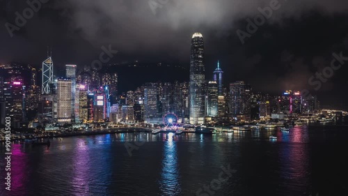 Wallpaper Mural View of Hong Kong at night over the water with reflection, aerial hyperlapse, Hong Kong, China, 4K Torontodigital.ca
