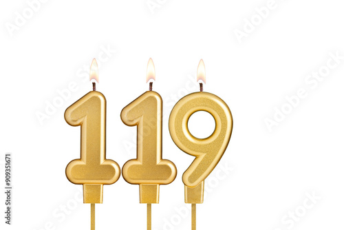 Golden number 119 birthday candle on white background