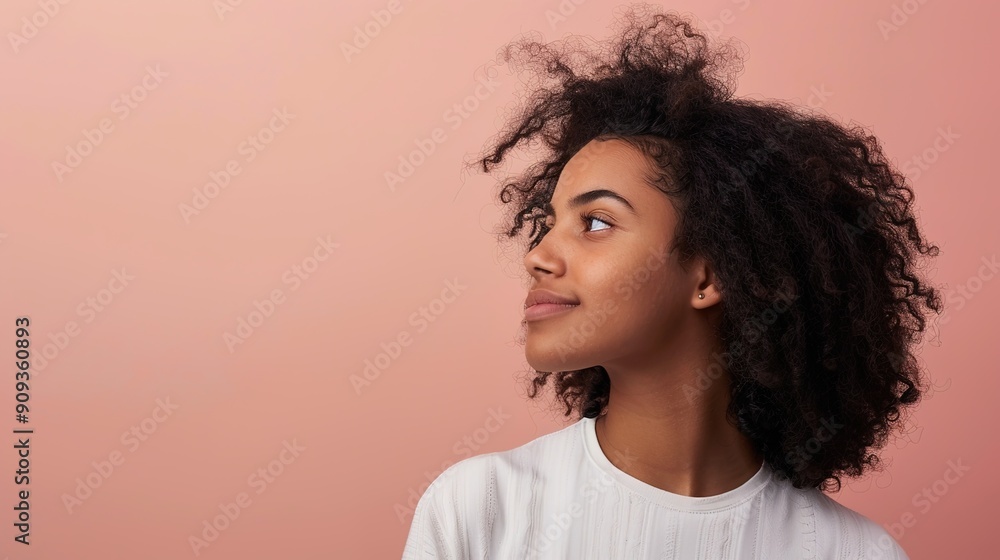 Serene Young Girl in Casual Attire Gazing Sideways Against Neutral Background - Relaxed Mood and Comfort Serene Young Girl in Casual Attire Gazing Sideways Against Neutral Background - Relaxed Mood and Comfort