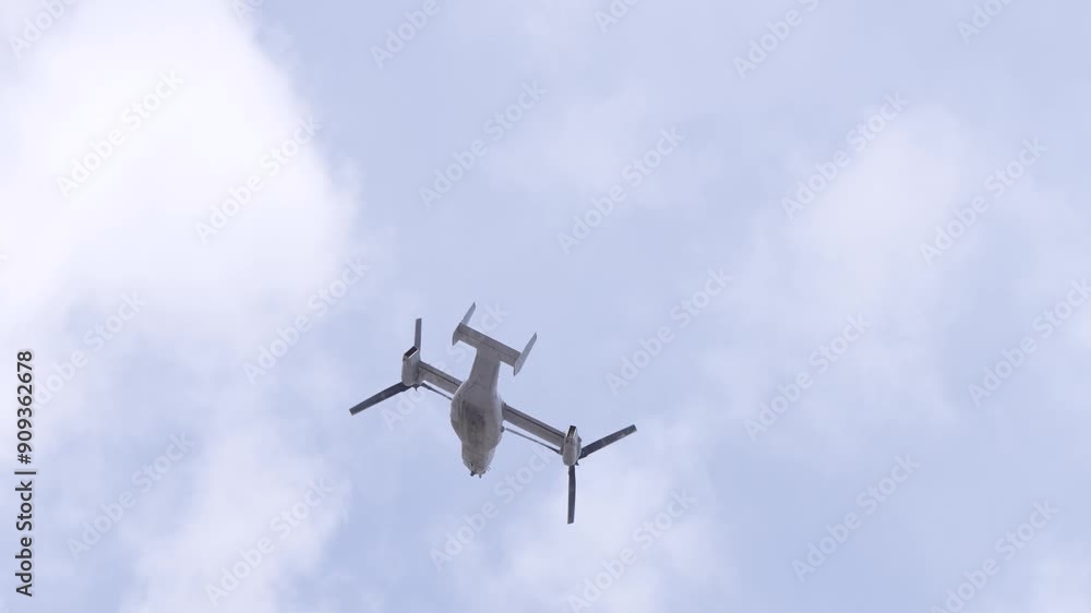 V-22 Osprey with rotors in slow motion flight V-22 Osprey with rotors in slow motion flight