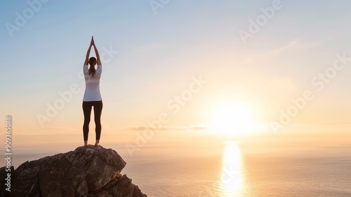 Serene Yoga Practice: Confident Woman in Athleisure on Cliff Overlooking Ocean at Sunrise