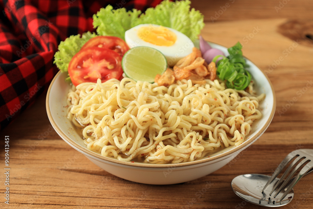 Indomie Rebus Ayam Bawang, Chicken Garlic Soup Instant Noodle Flavour with Boiled Egg Indomie Rebus Ayam Bawang, Chicken Garlic Soup Instant Noodle Flavour with Boiled Egg