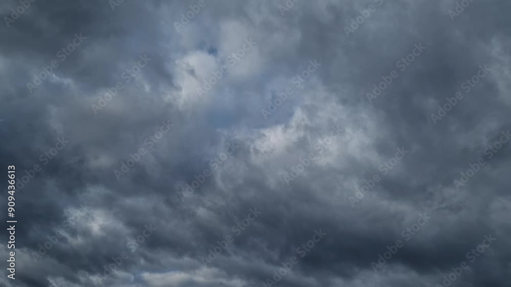 Overcast timelapse background with fast moving rain clouds on the sky. Cloudy and windy weather Overcast timelapse background with fast moving rain clouds on the sky. Cloudy and windy weather