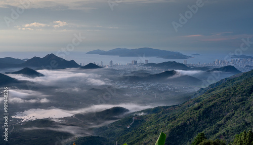 The sunrise on the high mountains, far away is the famous coastal tourist city of Nha Trang