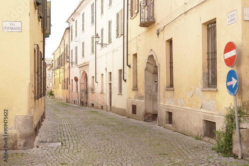 View of  a glimpse of a street in the ancient historic center of Tortona. Piedmont Region , Italy
