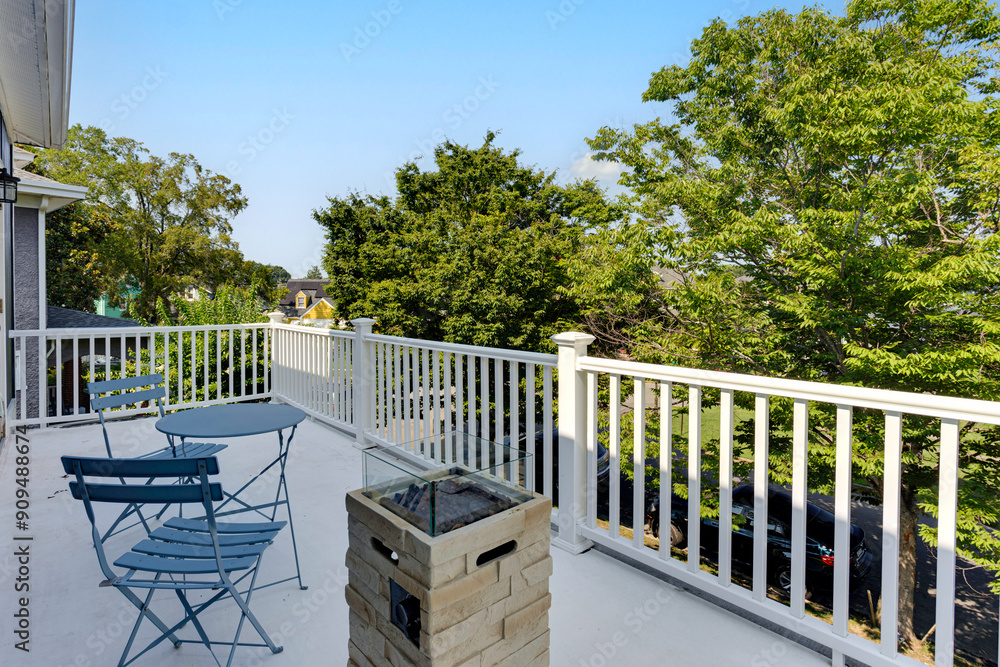 Outdoor Second Floor Balcony With Patio Furniture Overlooking Lush Greenery Outdoor Second Floor Balcony With Patio Furniture Overlooking Lush Greenery