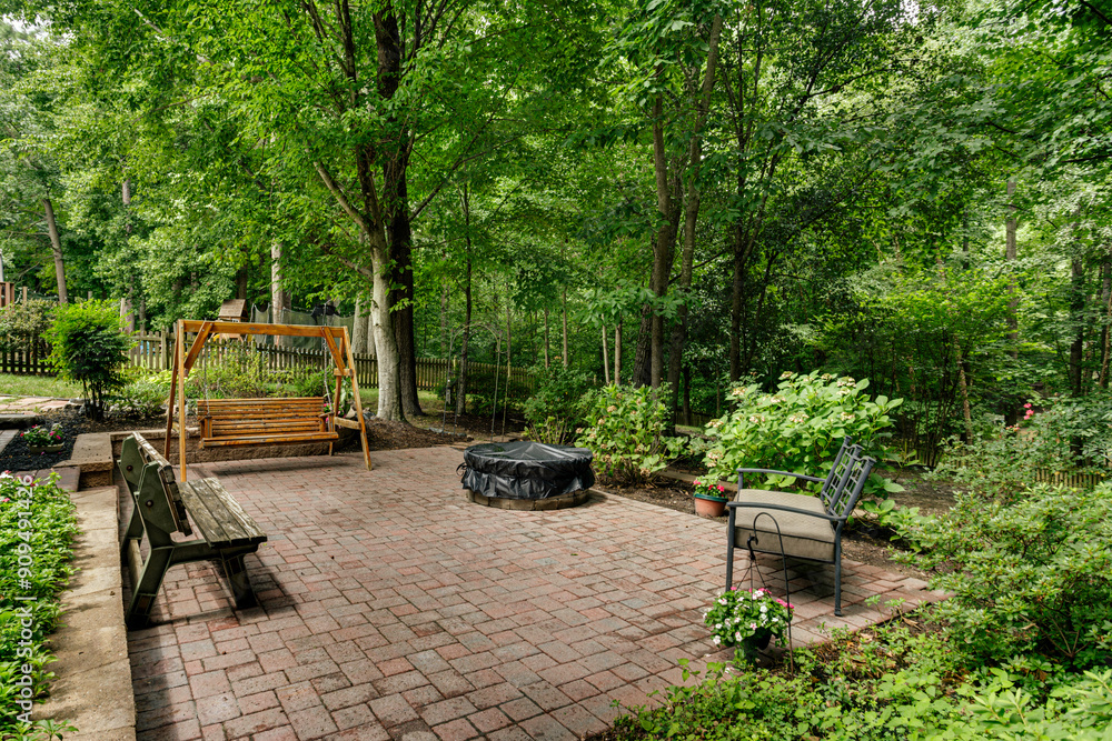 Charming Garden Patio With Wooden Swing And Cozy Seating Area For Relaxation Charming Garden Patio With Wooden Swing And Cozy Seating Area For Relaxation
