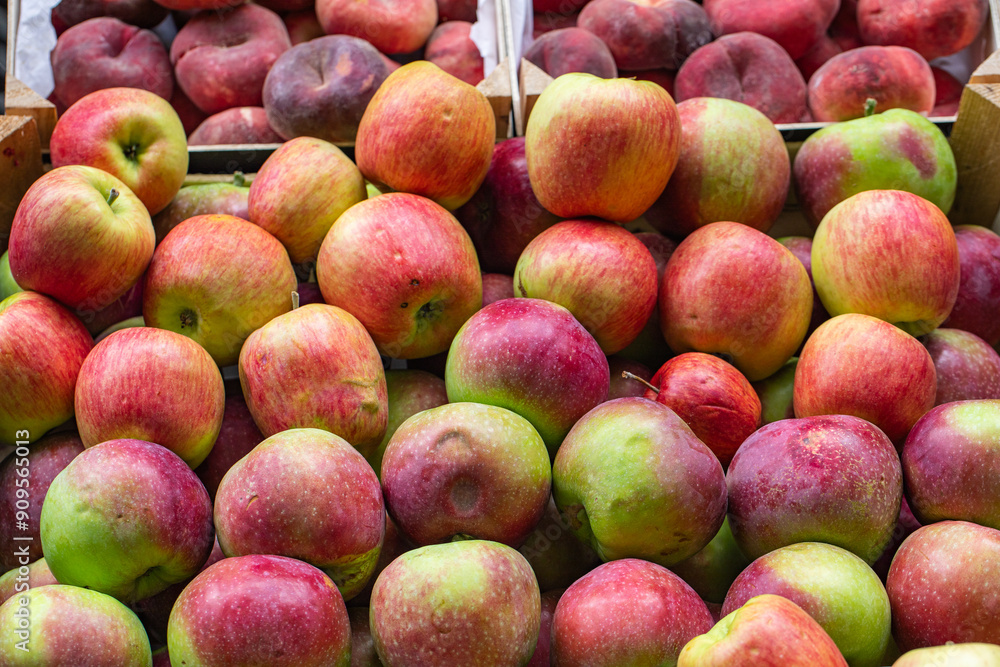 Ripe red local pears on a stand at a farmers market. Fresh fruit. Source of vitamins. Healthy food. Ripe red local pears on a stand at a farmers market. Fresh fruit. Source of vitamins. Healthy food.