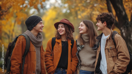 Group_of_happy_friends_walking_in_the_autumn_park.
