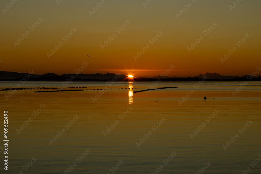 Sunrise over the majestic Pullao Bay on the southern archipelago of Chiloé Island, Chile. Sunrise over the majestic Pullao Bay on the southern archipelago of Chiloé Island, Chile.