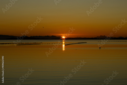 Sunrise over the majestic Pullao Bay on the southern archipelago of Chiloé Island, Chile.