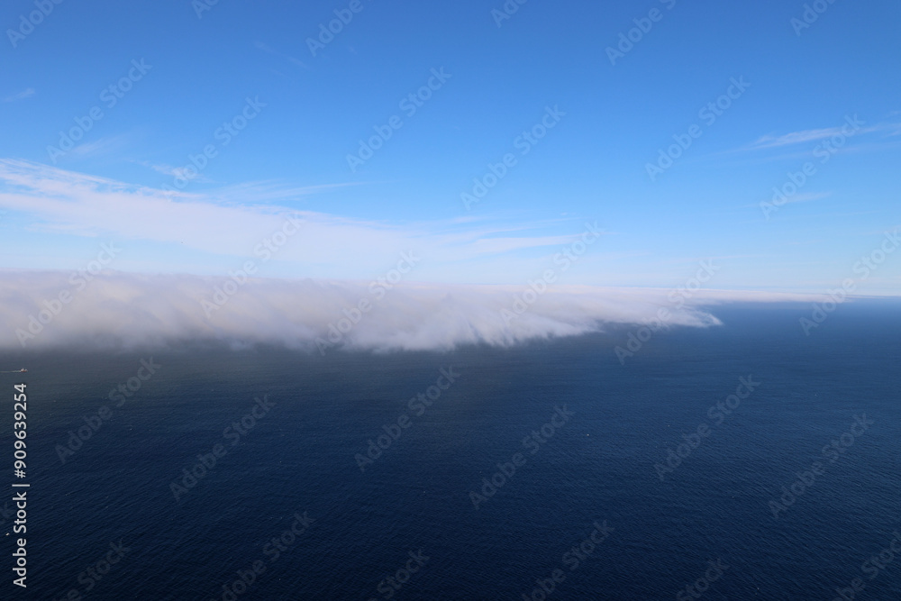 Obraz premium Huge wall of fog coming from the sea towards the North Cape-Nordkapp, Norway 