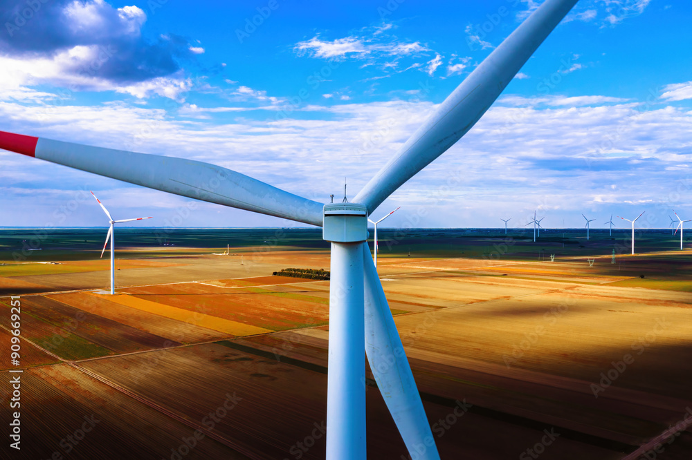 Aerial view of wind turbines on an onshore wind farm Aerial view of wind turbines on an onshore wind farm