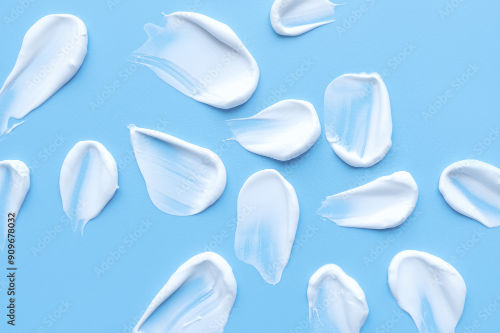 A smear of cream on a light background. Beauty concept. A smear of cream on a light background. Beauty concept.