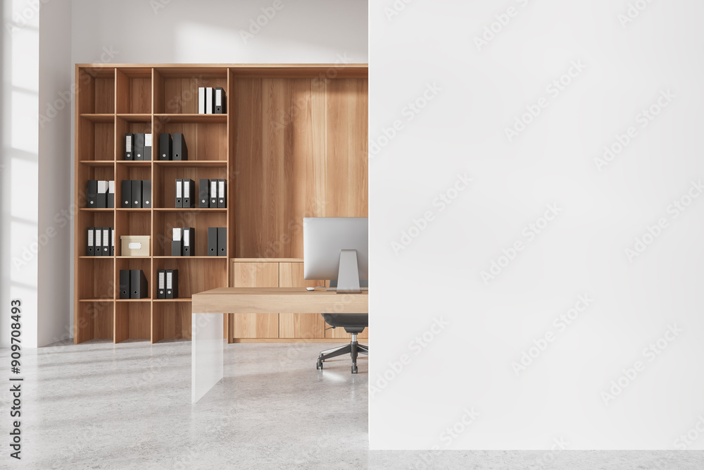 Fototapeta premium Office business interior with work table, pc computer and shelf. Mockup wall