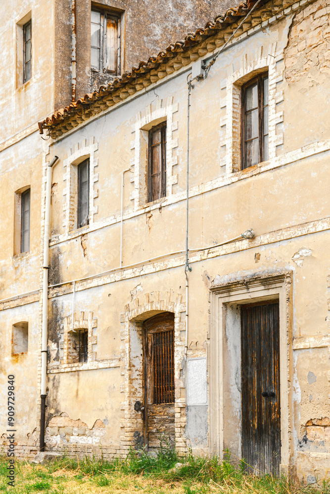 Facade of ancient dilapidated house Facade of ancient dilapidated house