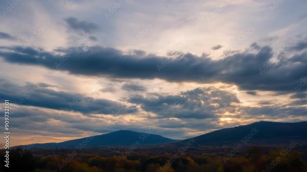 A tranquil landscape showcasing mountain silhouettes under a dramatic sunset with vibrant clouds and serene nature A tranquil landscape showcasing mountain silhouettes under a dramatic sunset with vibrant clouds and serene nature