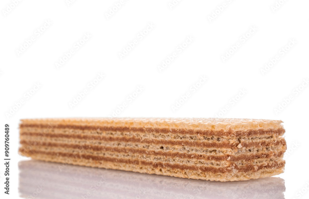 One vanilla wafer, macro, isolated on white background. One vanilla wafer, macro, isolated on white background.