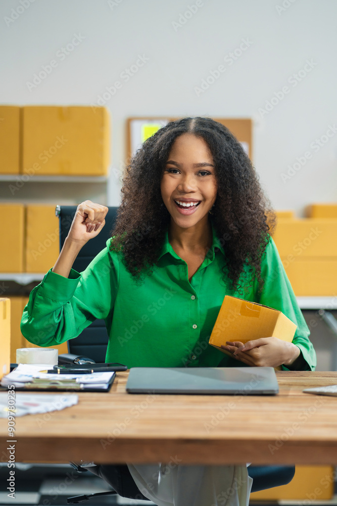 Successful Woman start up online seller at workplace. small business entrepreneur SME or freelance woman working with box at home. Successful Woman start up online seller at workplace. small business entrepreneur SME or freelance woman working with box at home.