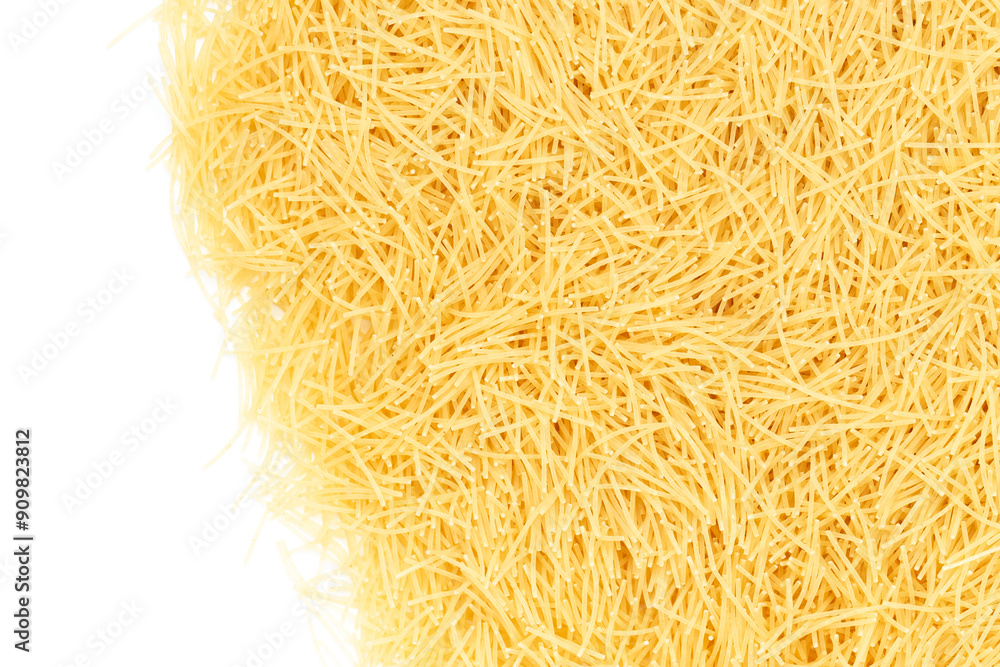 Fotografie Uncooked vermicelli pasta on white background