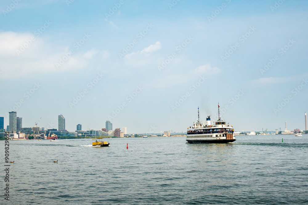 passenger ferry crossing an urban harbour in summer room for text shot toronto Islands passenger ferry crossing an urban harbour in summer room for text shot toronto Islands