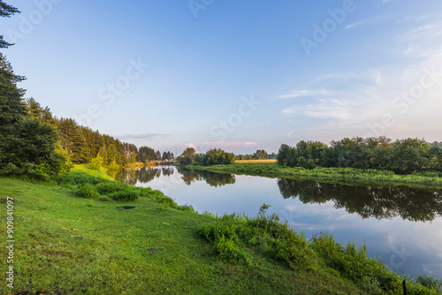 A calm river with trees on both sides