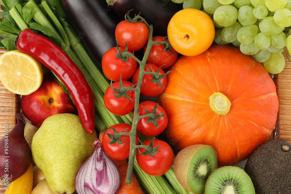 Different fresh fruits and vegetables in basket, top view Different fresh fruits and vegetables in basket, top view