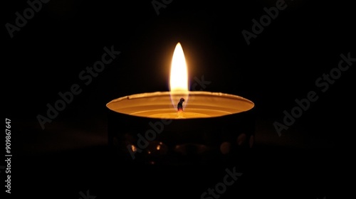 Single Candle Flame in the Dark