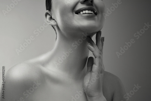 Fotografie Gorgeous woman showing her beautiful neck, closeup