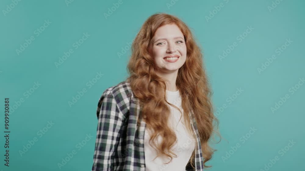 Beautiful woman in plaid shirt wear asks join her, beckons with inviting hand hugs gesture. Young lady calling - Hey you, come here. Playful, inviting to come Beautiful woman in plaid shirt wear asks join her, beckons with inviting hand hugs gesture. Young lady calling - Hey you, come here. Playful, inviting to come