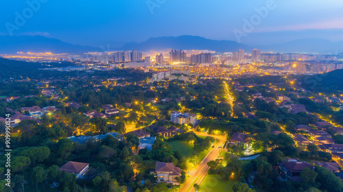 Aerial view of peaceful cityscape before sunrise.