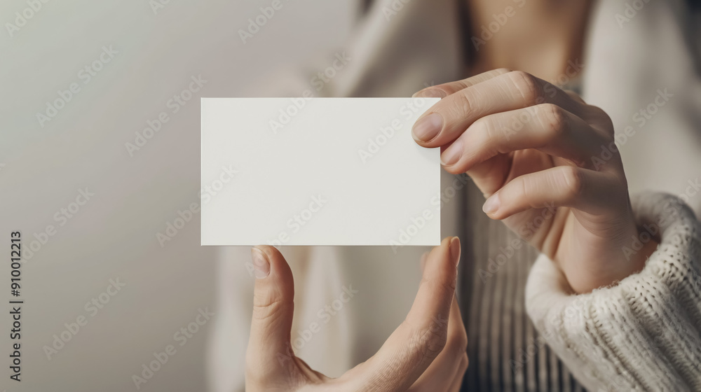 Woman holding blank business card. White Paper Card for Mockup Woman holding blank business card. White Paper Card for Mockup