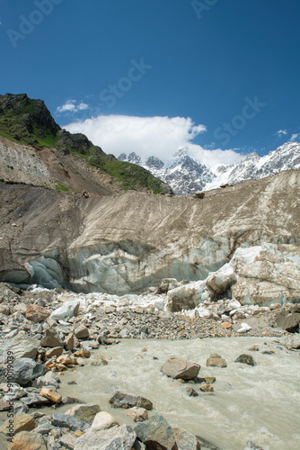 Ushba Chalaadi Glacier. Samegrelo-Upper Svaneti, Georgia.Snowy mountains of Mestia Svaneti in a sunny white cloudy weather.
 photo