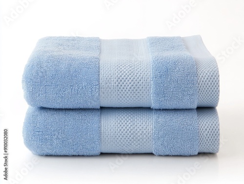 A transparent background shows a stack of light blue towels