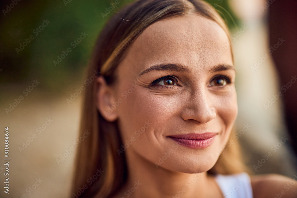 A happy woman looking at her male partner, close-up photo. A happy woman looking at her male partner, close-up photo.