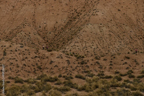 Dramatic Clouds Over Arid Canyon Landscape photo