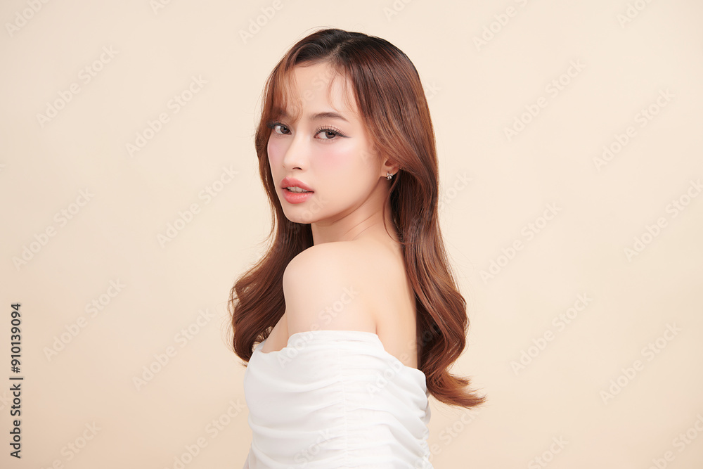 Beautiful young asian woman with clean fresh skin on beige background, Face care, Facial treatment, Cosmetology, beauty and spa, Asian women portrait. Beautiful young asian woman with clean fresh skin on beige background, Face care, Facial treatment, Cosmetology, beauty and spa, Asian women portrait.
