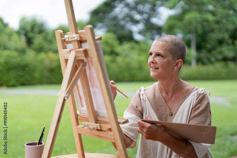 Senior Woman Painting Outdoors on a Sunny Day, Engaged in Creativity Art Activity in a Serene Garden Setting Senior Woman Painting Outdoors on a Sunny Day, Engaged in Creativity Art Activity in a Serene Garden Setting