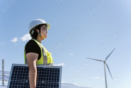 female technician working in solar power station